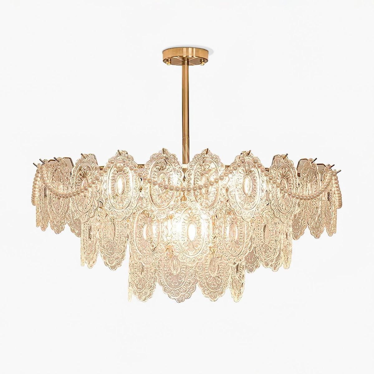 This Clérachic chandelier with tiers of patterned glass and pearl beads, seen straight on against a white background.