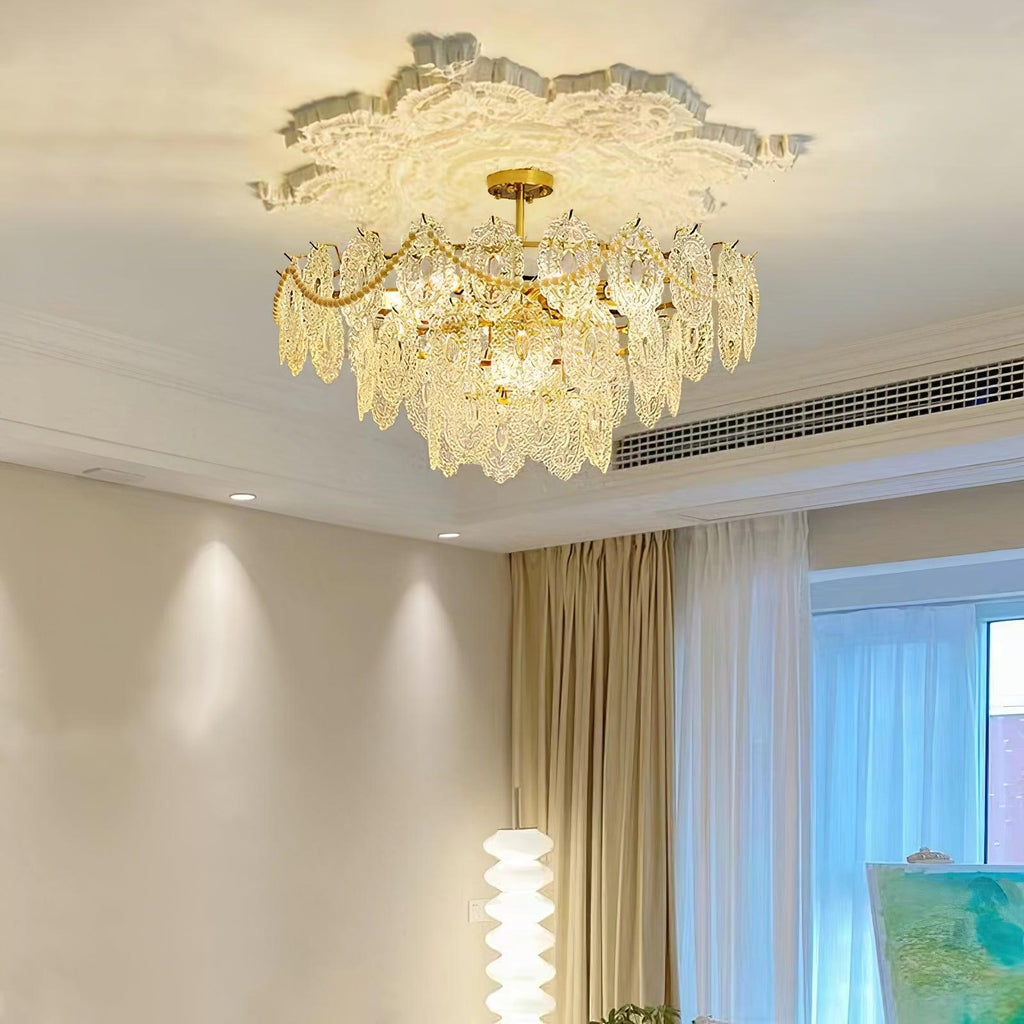 Clérachic chandelier below a plaster ceiling rose in a room with an air vent, gold curtains and a bright window.