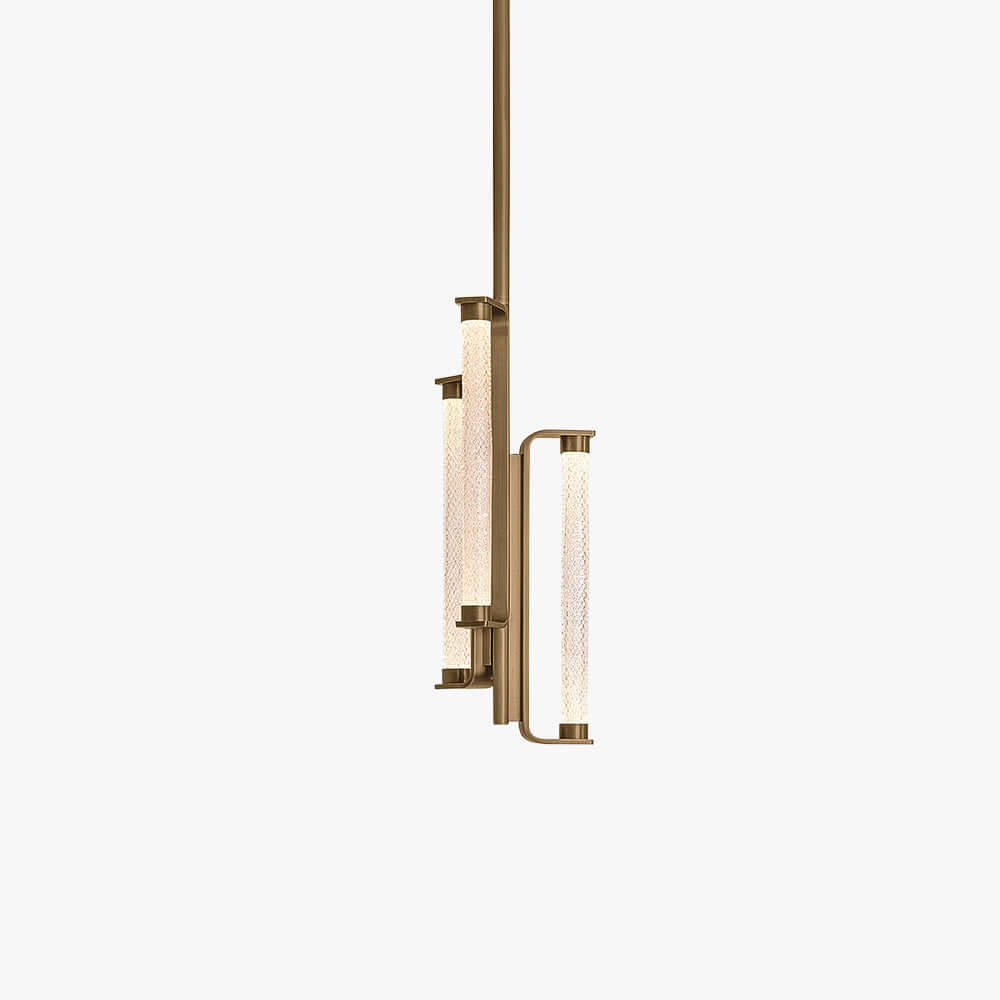 This Clérachic pendant on a plain white backdrop, three slim textured glass tubes on a brass frame hung from a single long brass rod.