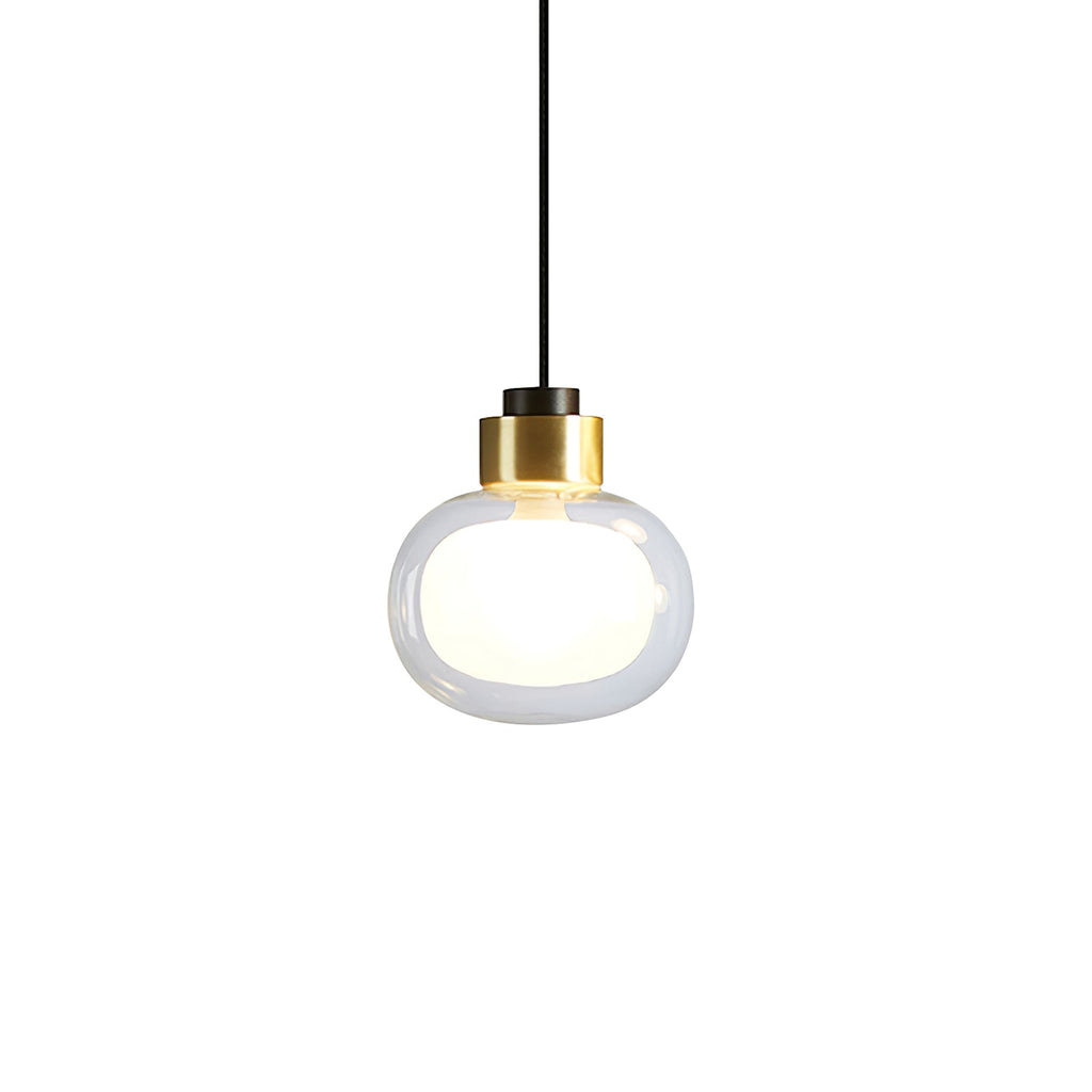 Clear glass pendant with a gold-finish collar, a black cord and a white inner glow, on a plain white backdrop, from Clérachic.