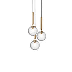 Three clear textured globes on brass rods, a Clérachic pendant trio shown at staggered heights on white.
