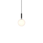 Clérachic pendant with a black rod and one white opal globe, shown lit on a plain white background.