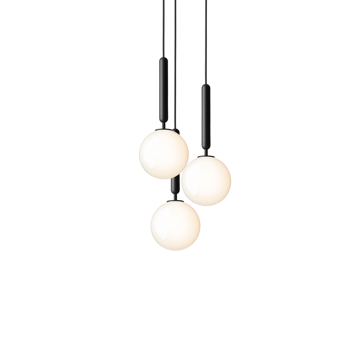 Clérachic pendant trio with white opal globes on black rods, hung closely together on a white background.