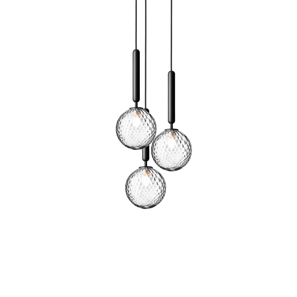 Clérachic trio of pendants with clear textured globes and black rods, shown unlit on a white background.