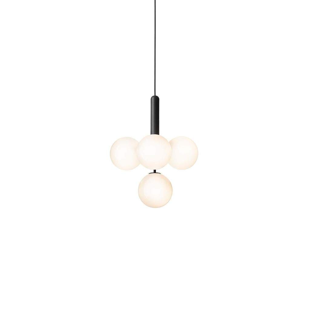 Clérachic four-globe cluster pendant with white opal glass and a black rod, cut out on a white background.