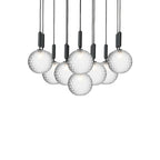 A dense Clérachic canopy with clear textured globes on black rods, shown from just below on white.