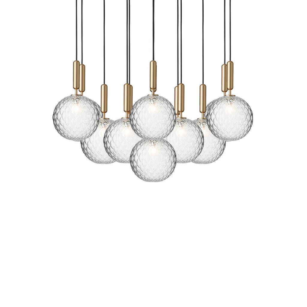 Wide Clérachic cluster of pendants with clear globes on brass rods, shown unlit on a white background.