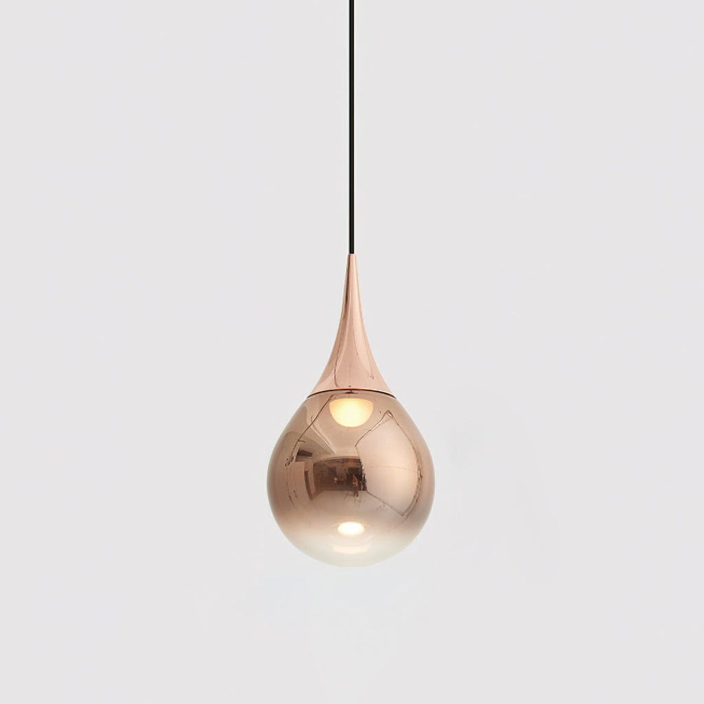 Rose gold Clérachic pendant with a polished teardrop shade, hanging from a black cord against a pale grey backdrop.
