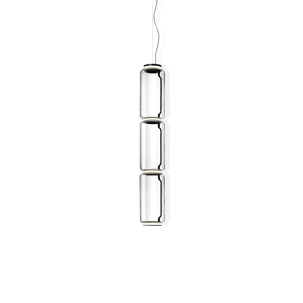 Three stacked clear glass cylinders with dark rings, this Clérachic pendant seen on a plain white backdrop.