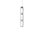 Three stacked glass cylinders hanging from a thin cable, this Clérachic pendant on a plain white backdrop.