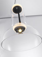 Looking up into the dome of this Clérachic pendant, at the small light source and the glowing ring above it.