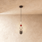 Clérachic tall pendant with a white capsule, red bead, opal globe and a smoked glass capsule with a glowing light strip.