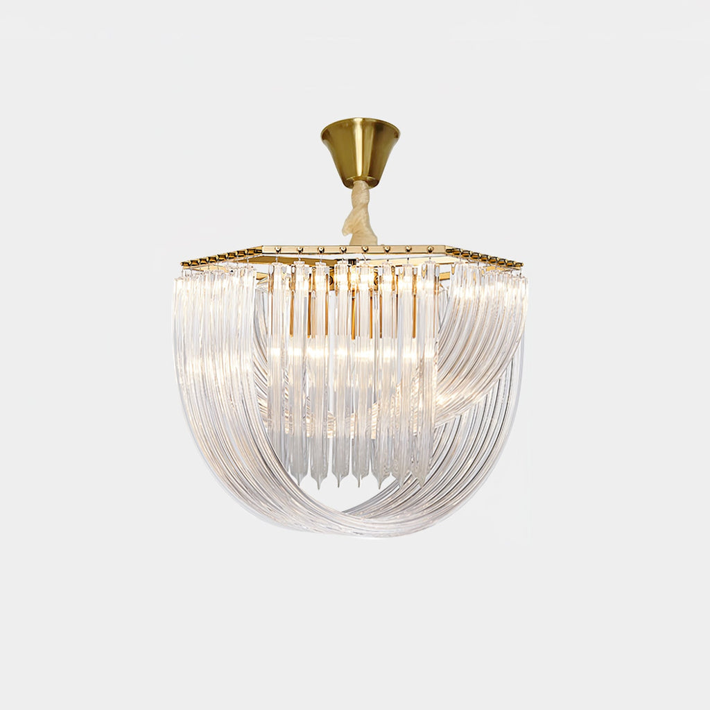 Unlit Clérachic chandelier with a brushed brass canopy and cord and a looped clear glass rod frame, on a pale grey backdrop.