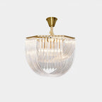 Unlit Clérachic chandelier with a brushed brass canopy and cord and a looped clear glass rod frame, on a pale grey backdrop.