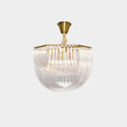 Clérachic chandelier with looped clear glass rods and a brass canopy on a short cord, shown unlit on a pale grey backdrop.