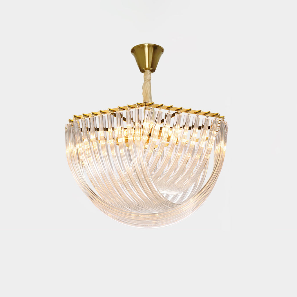 Clérachic chandelier with a brass canopy, a looped clear glass rod bowl and a warm glow from within, on a pale grey backdrop.