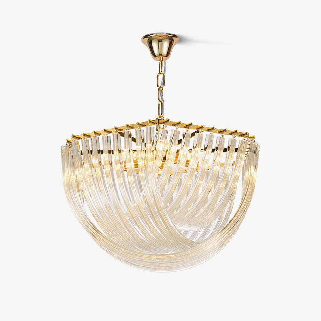 Gold-framed glass chandelier with curved clear glass rods sweeping into a bowl shape, hung from a gold chain on a plain white backdrop from Clérachic.