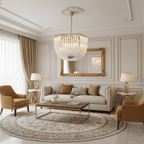 Clérachic glass chandelier above a pale living room with a round patterned rug, a gold-framed mirror and tan armchairs.