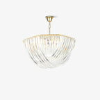 Clérachic chandelier with looped clear glass rods and a gold top on a short gold chain, shown on a plain white backdrop.