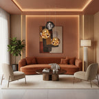 Three Clérachic glass pendants hang above a low coffee table and a curved rust sofa, in a room with a terracotta feature wall.