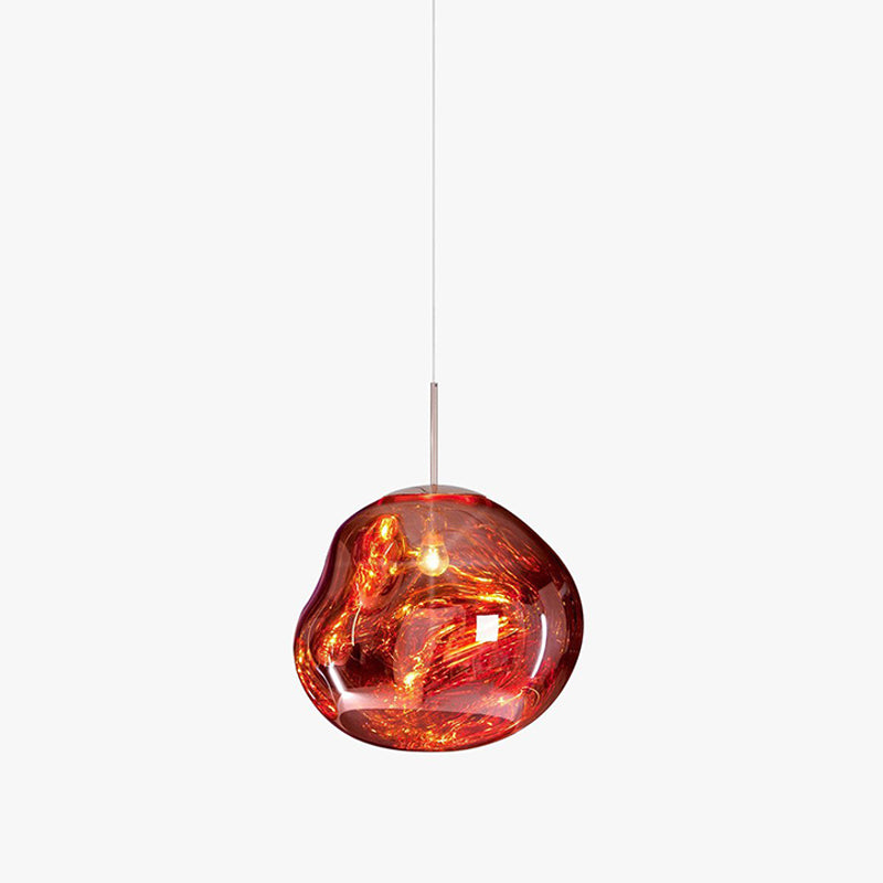 A Clérachic copper-red glass pendant on a plain light backdrop, with a short silver rod and a lit bulb inside.
