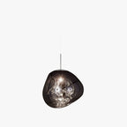 A Clérachic smoke-grey glass pendant on a plain backdrop, with a silver rod and a swirled silver inner surface.