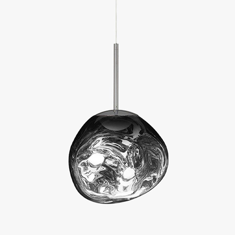 A Clérachic silver glass pendant on a pale backdrop, with a long polished rod and bright swirls across its surface.