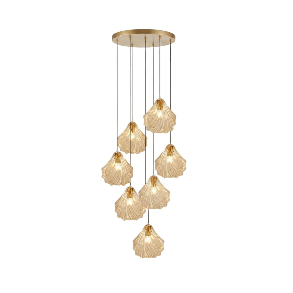 A Clérachic cluster of seven cognac glass shell pendants hangs at staggered lengths from a round brass plate, on white.