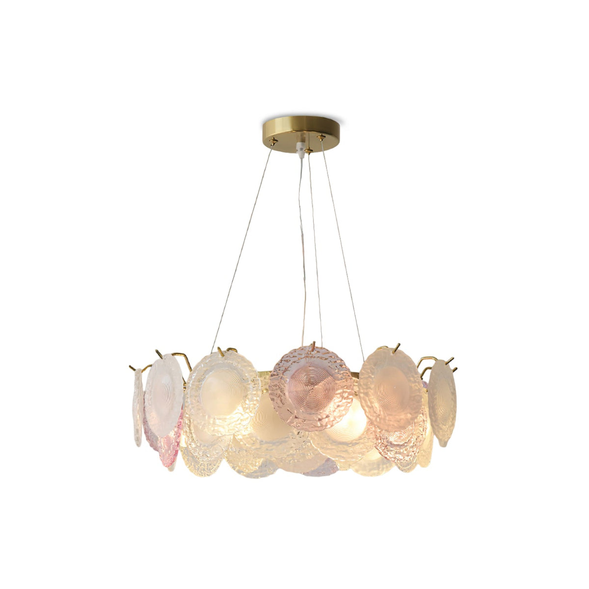 A Clérachic round pendant with pink and frosted glass discs on a gold frame, hung from wires, on a white backdrop.