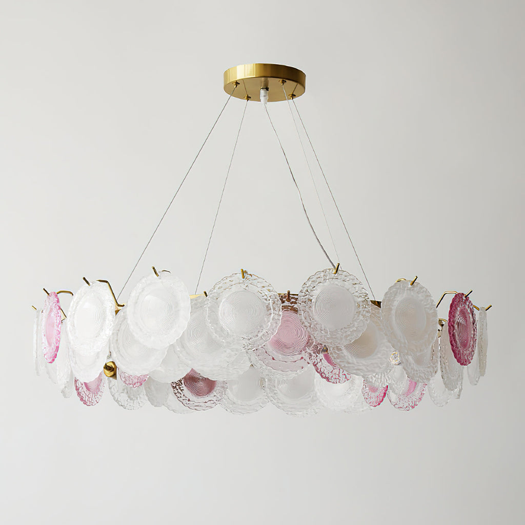 The Clérachic pendant, switched off, hung on three wires with a flatter ring of frosted and pink glass discs.