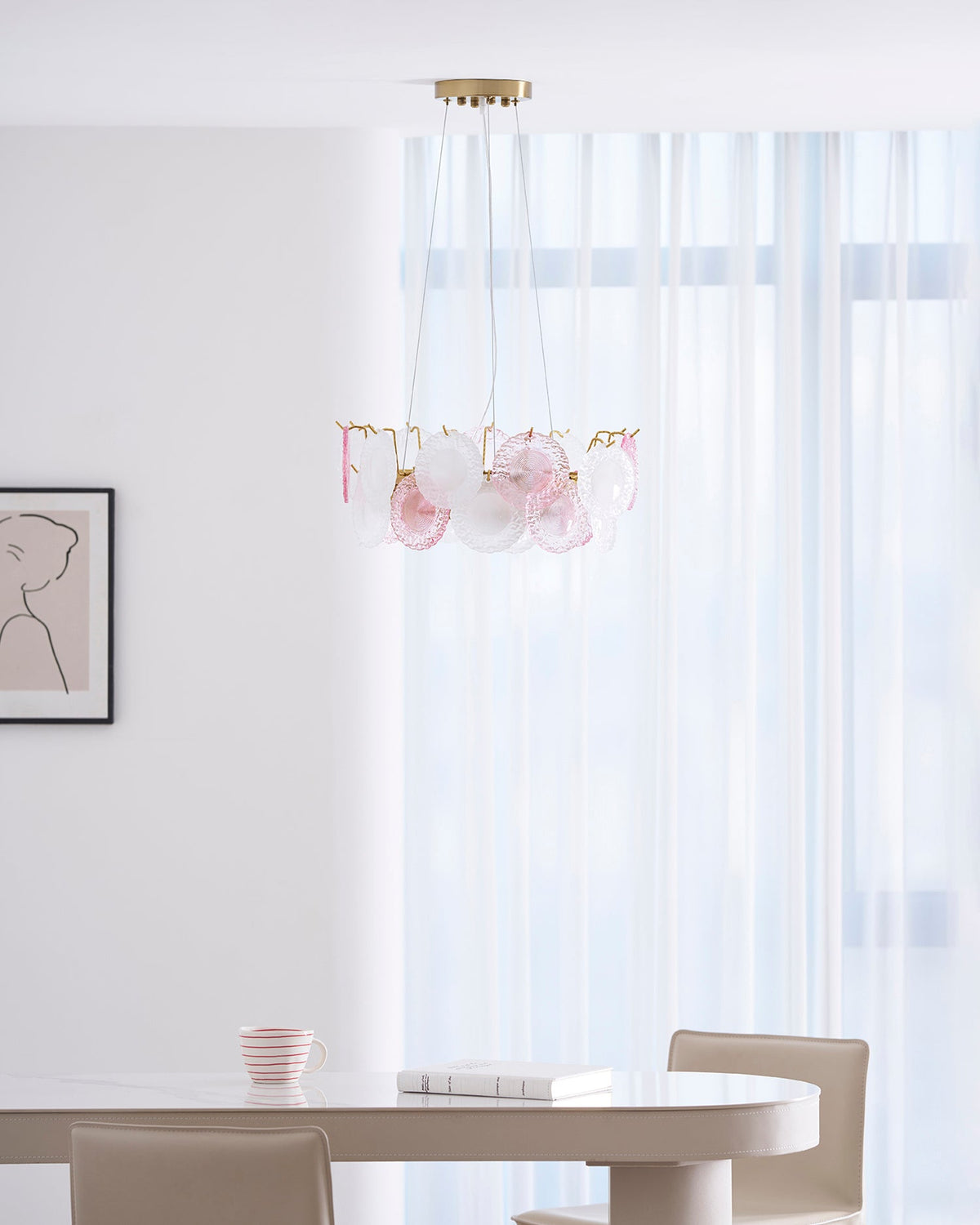 A distant view of the Clérachic pendant in a bright dining area, with sheer curtains and a table with chairs below.