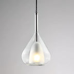 Clear glass teardrop pendant from Clérachic with a frosted inner shade and a chrome-coloured stem, on a soft grey backdrop.