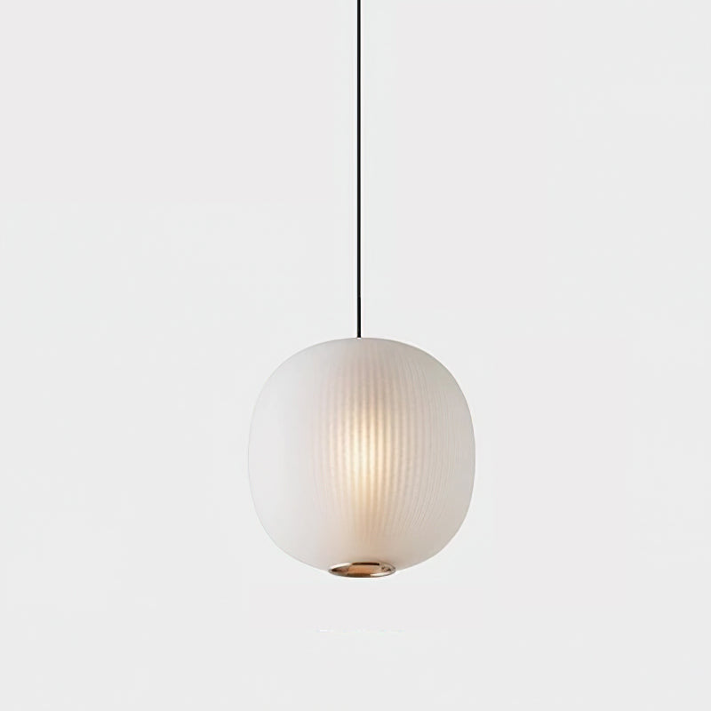Matte white Clérachic ribbed pendant glowing against a soft grey backdrop, hanging from a slim black cord.
