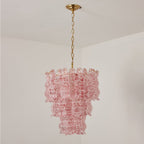 Pink Clérachic pendant unlit, the red-speckled glass panels falling in three tiers from a brass canopy and chain.