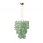 Smaller view of the green Clérachic pendant on white, showing the speckled glass tiers and the brass chain.