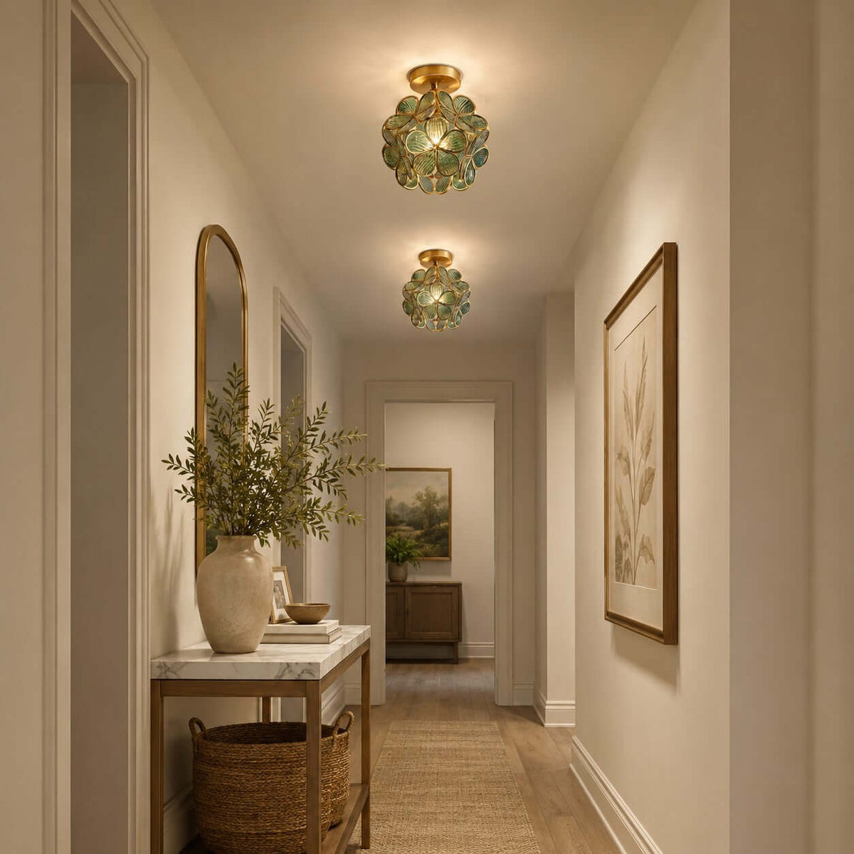 Two blue-green petal Clérachic ceiling lights along a narrow hall with a marble-topped console and a woven basket.