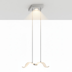 A single lit Clérachic seagull pendant hangs on two cables from a square chrome canopy with a warm downlight.