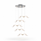 Five lit gulls hang in a loose column from a small chrome canopy on this Clérachic seagull chandelier, with a soft floor shadow.
