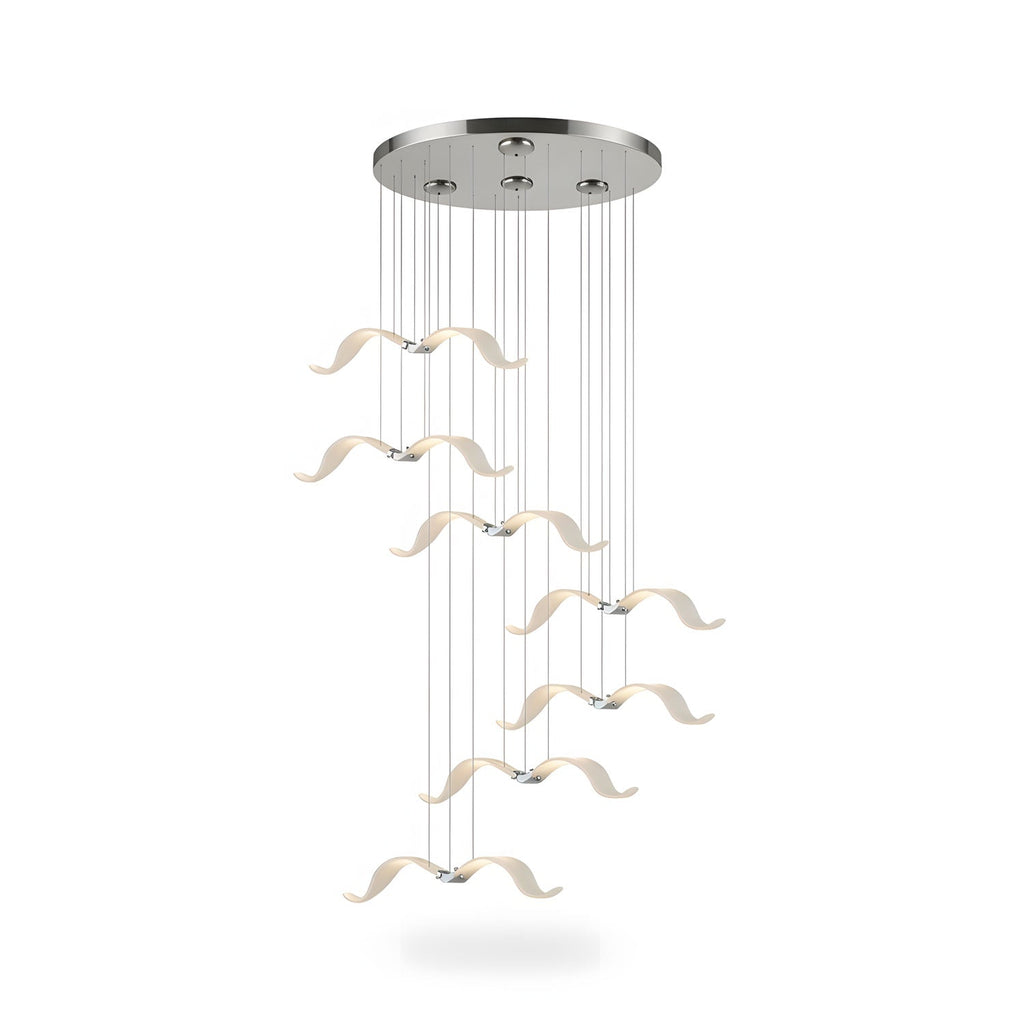A Clérachic seagull chandelier with a chrome canopy and gulls spread in a loose column, with a soft shadow beneath.