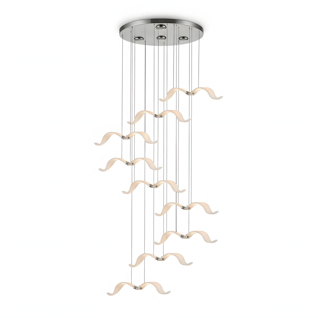 This Clérachic seagull chandelier has a chrome canopy and a tall, staggered cascade of lit gulls on fine cables.