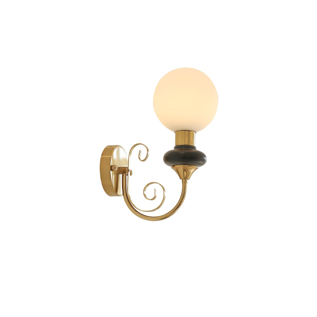 Black-collared Clérachic wall light with a warm lit globe and gold arm, on a plain white background.