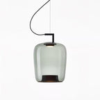 Tall pale grey-green glass Clérachic pendant with a black bracket and a dark ring inside the base, on white.