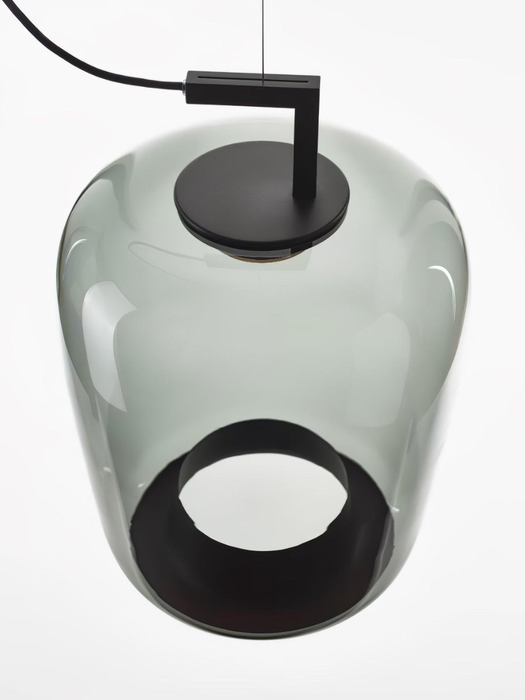 Close view from below of a grey-green glass Clérachic pendant, with its black cap on top and a round black opening.