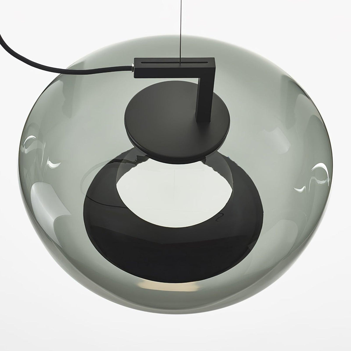 Close view from below of a rounded grey glass Clérachic pendant, with its black disc cap and a dark ring opening.