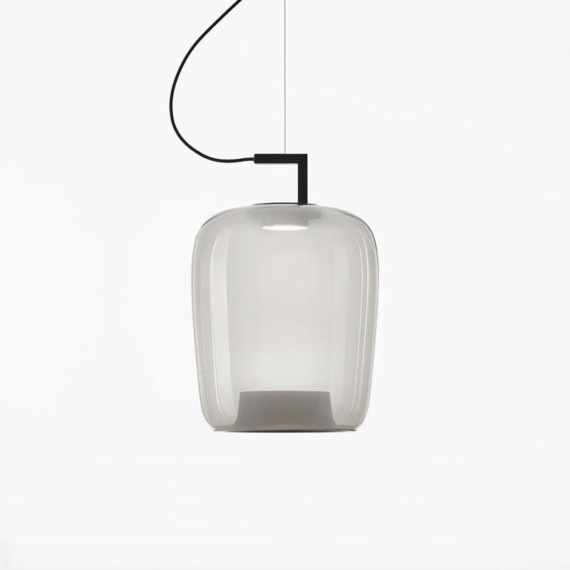 Tall pale grey glass Clérachic pendant with a black bracket, the inner base faintly visible, on a white backdrop.