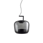 Squat smoke grey glass Clérachic pendant with a black bracket and a dark base, hanging on a thin cord.