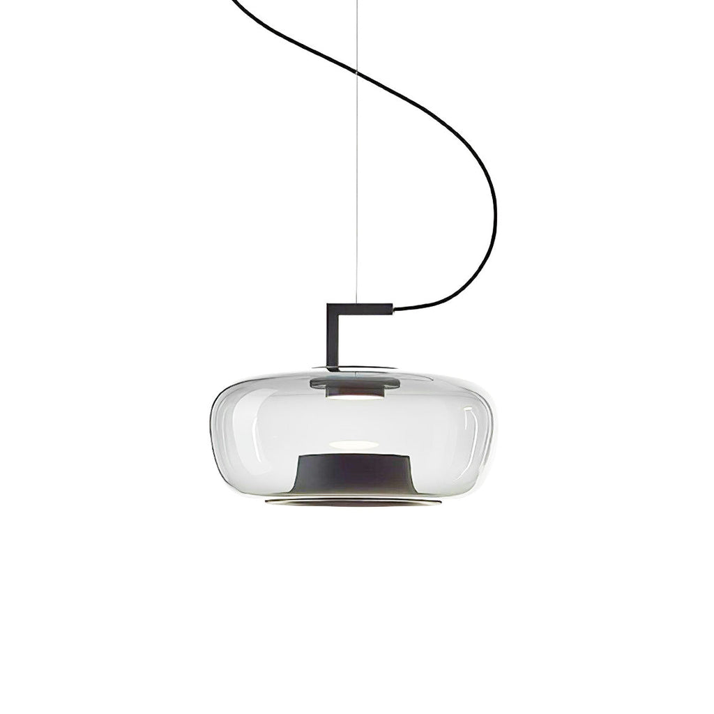 Wide clear glass Clérachic pendant with a black bracket and a dark base ring on a curved cord, on white.