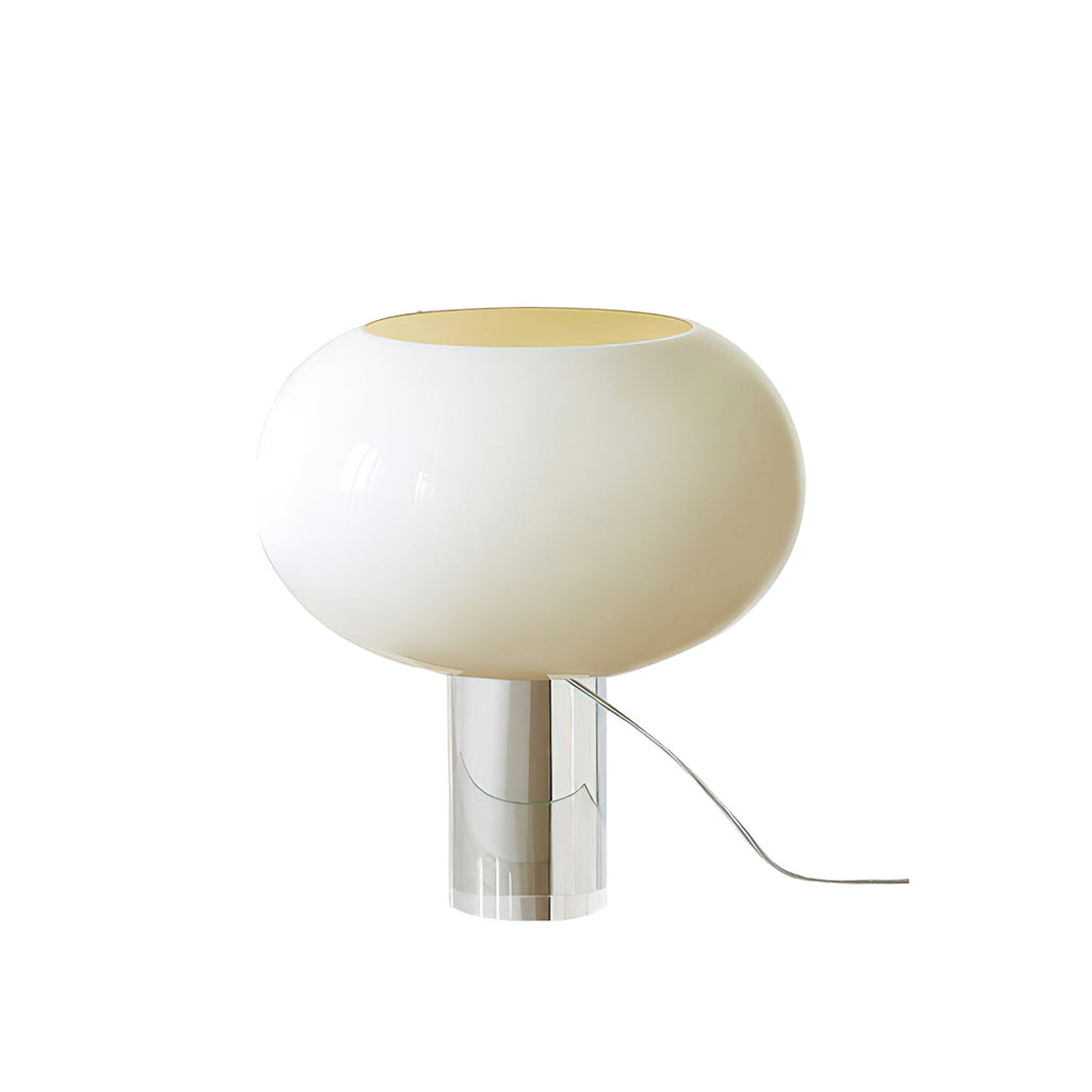 A white glass Clérachic globe lamp with a wide open top rests on a clear cylindrical base, shown on a plain white backdrop.