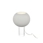 A smaller grey Clérachic table lamp, its frosted globe on a short clear base, with a clear cord looping to the right.