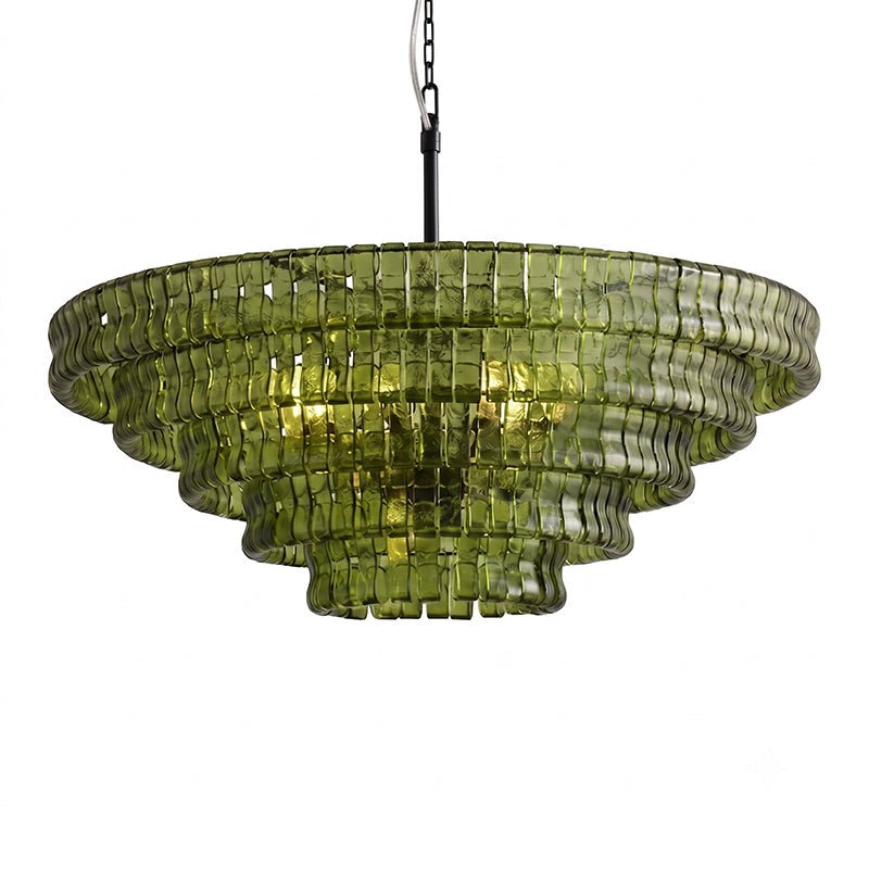Wide and flat in shape, this green glass Clérachic chandelier has five tiers on a black stem, shown on white.